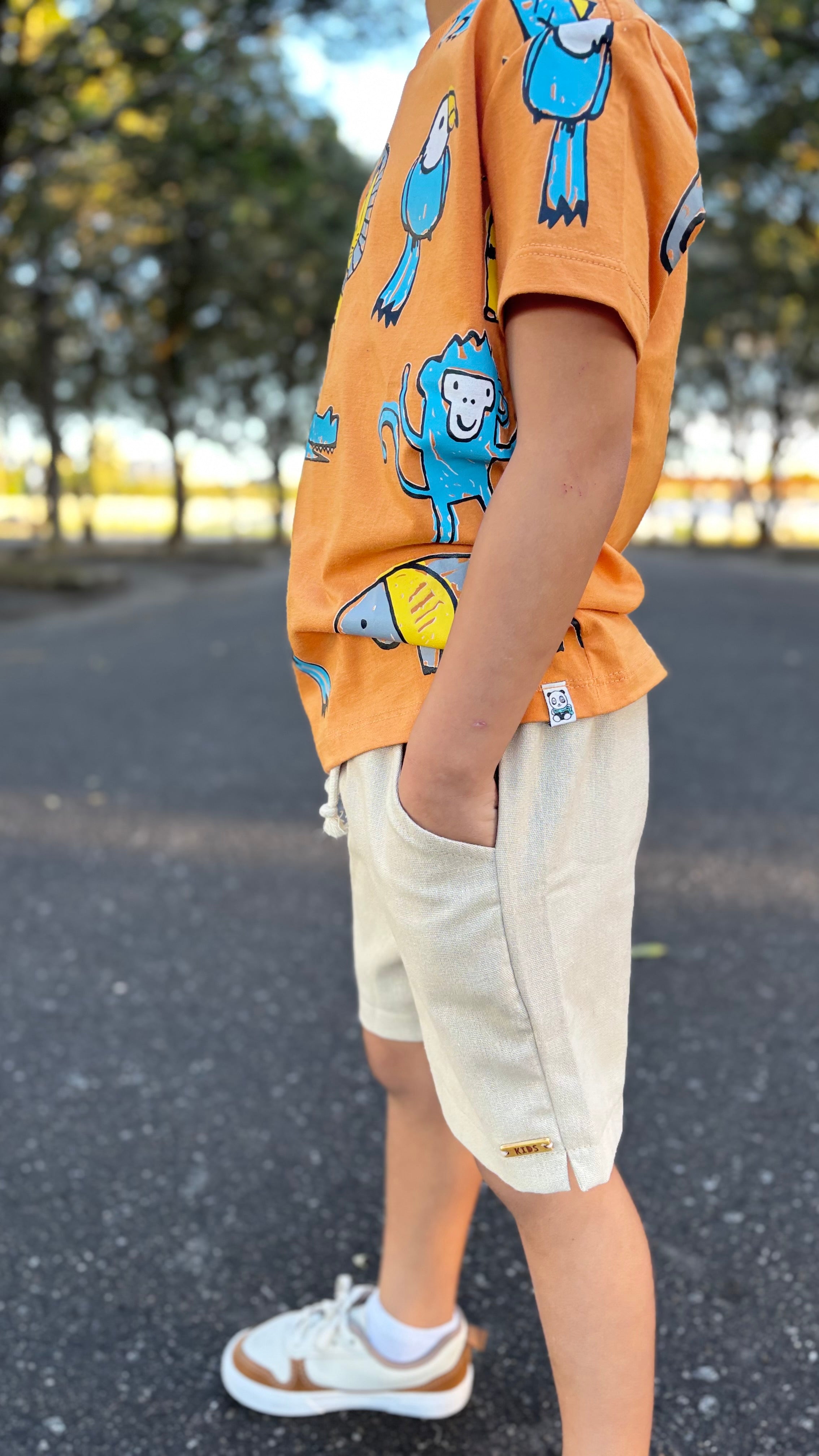 T-Shirt Infantil Laranja com Estampa Safari - 100% Algodão | Lá Colorê