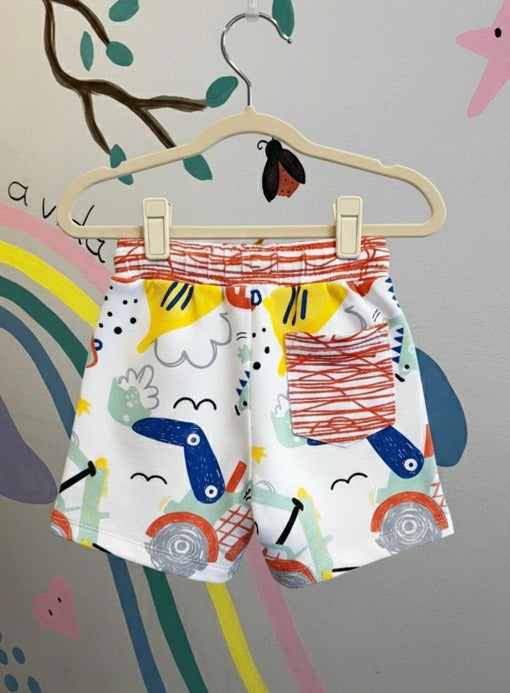 Bermuda Infantil Lúdica com Estampa de Retro e Dino | Lá Colorê